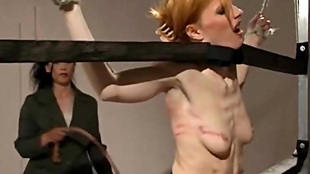 Extreme torture and spanking between a dominant lady and her slave