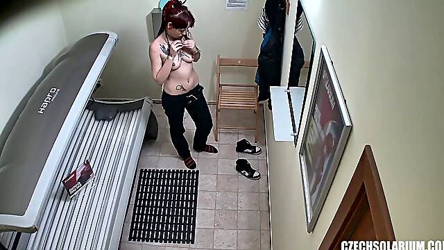 Punk Girl Secretly Masturbating in Solarium Tube