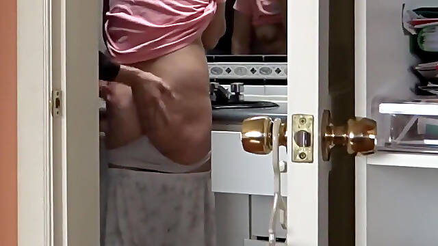 Stepmother Shows off in the Bathroom Before and After Having Sex with Her Lovers