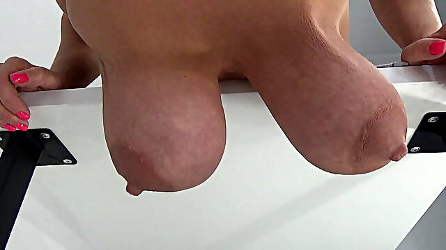 Big Boobs Hanging off the Table