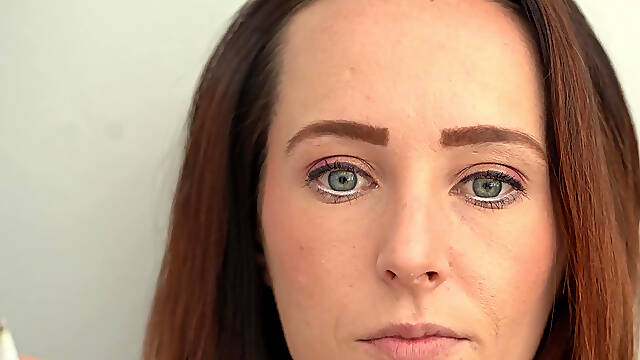 Extreme Close up Blue Eyed Redhead Smoking