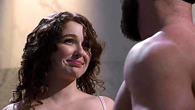 Seth Gamble massages Leana Lovings with oil in the shower.